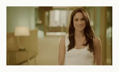 Woman With Long Dark Hair Laughing Open Mouthed GIF