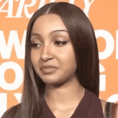 Woman With Long Dark Hair Making Funny Face GIF