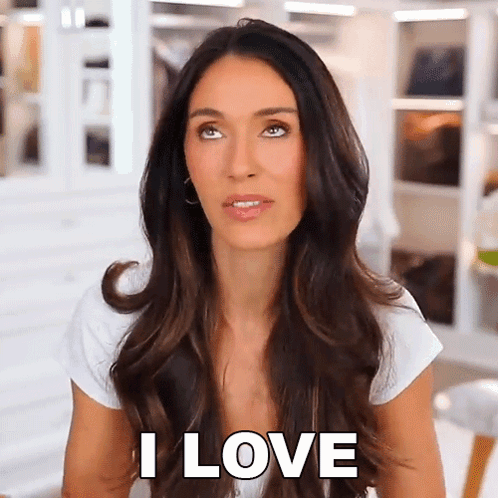 Woman With Long Dark Hair Sitting In Front Of Closet I Love GIF