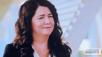 Woman With Long Dark Hair Smiling GIF