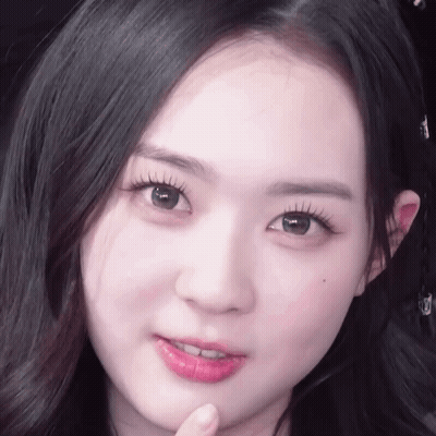 Woman With Long Eyelashes And Pink Lips GIF