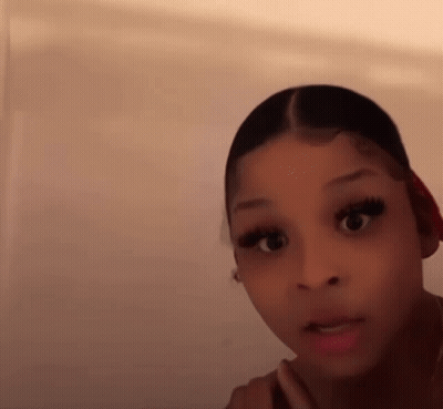 Woman With Long Eyelashes And Red Headband GIF