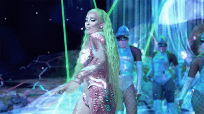 Woman With Long Green Hair Dancing on Stage