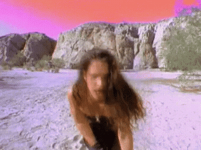 Woman With Long Hair And Beard Running On Beach GIF