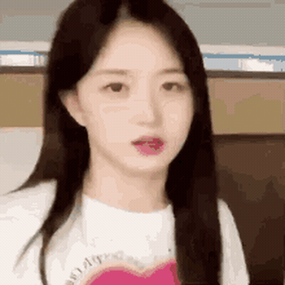Woman With Long Hair And Pink Heart GIF