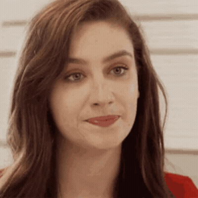 Woman With Long Hair And Red Shirt Close Up GIF