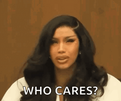 Woman With Long Hair Asking Who Cares GIF