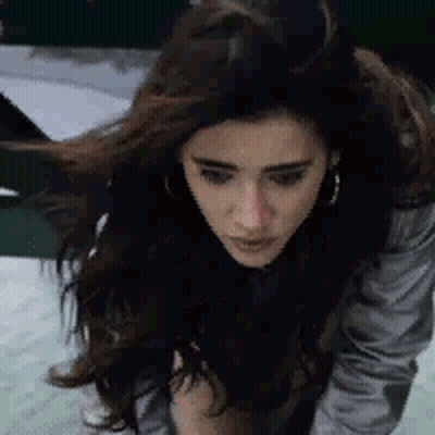 Woman With Long Hair Blowing In Wind GIF