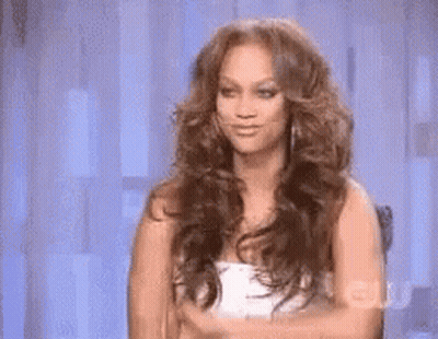 Woman With Long Hair Blue Wall GIF