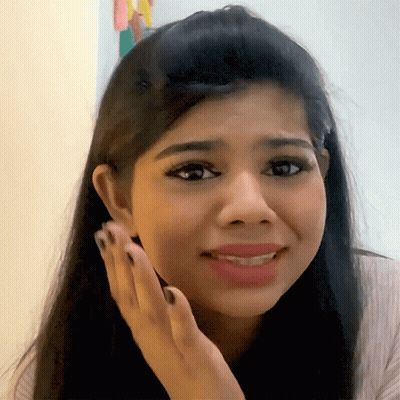 Woman With Long Hair Funny Face Hand On Face GIF