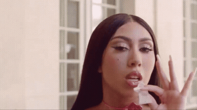 Woman With Long Hair Holding Paper And Peace Sign GIF