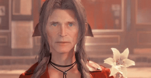 Woman With Long Hair Holding White Flower GIF