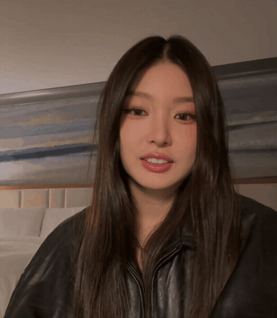 Woman With Long Hair In Black Jacket GIF