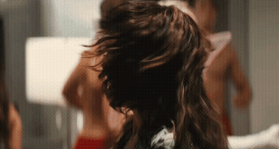 Woman With Long Hair In Front Of Mirror GIF