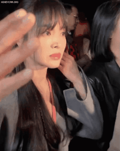 Woman With Long Hair Touched By Hand GIF