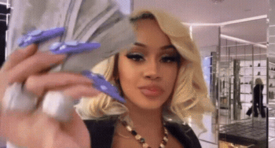 Woman With Long Nails Holding Money GIF