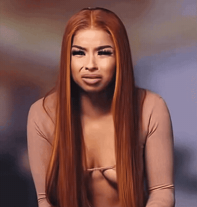 Woman With Long Red Hair In Plunging Neckline Top GIF