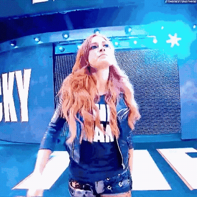 Woman With Long Red Hair Standing In Front Of Sky Screen GIF