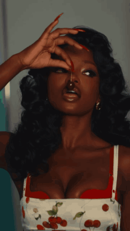 Woman With Long Red Nails And Cherry Dress GIF