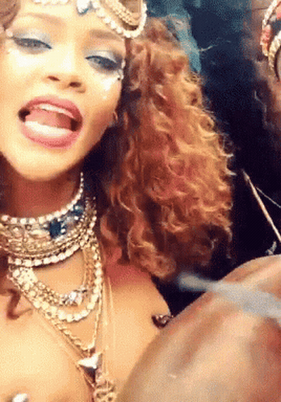 Woman With Many Necklaces And Earrings Making Funny Face GIF
