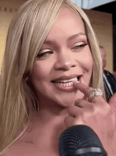 Woman With Microphone And Ring GIF