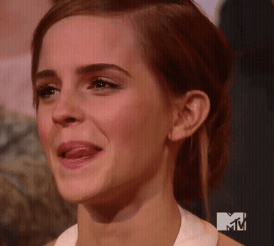 Woman With MTV Logo Behind Her GIF