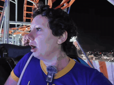 Woman With Neck Tattoo Riding Rollercoaster GIF