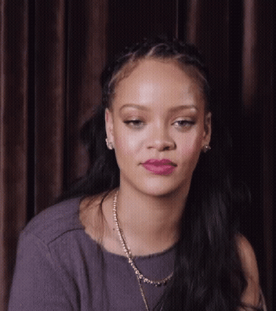 Woman With Necklace And Braided Hair GIF