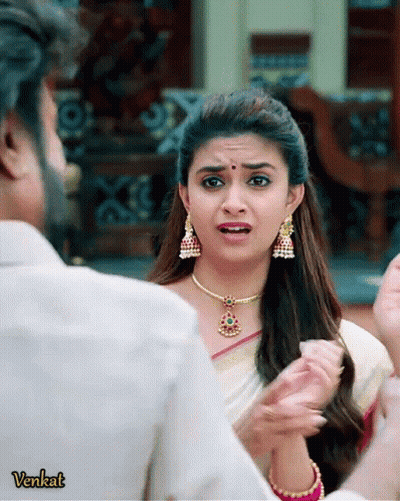 Woman With Necklace And Earrings Next To Man Venkat GIF