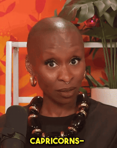 Woman With Necklace And Earrings Saying Capricorns GIF