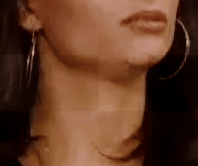 Woman With Necklace And Hoop Earrings GIF