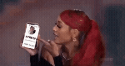 Woman With Necklace And TLC Logo GIF