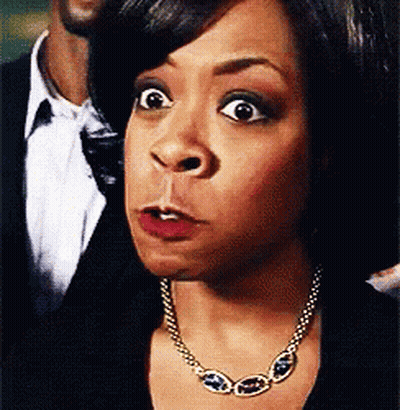 Woman With Necklace Making Funny Face GIF