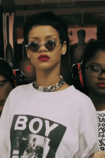 Woman With Necklaces And Earrings Funny Face GIF