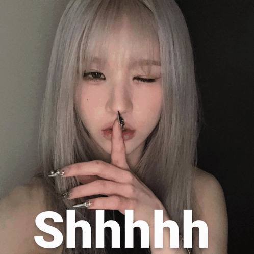 Woman With Needle In Nose Saying Shhh GIF