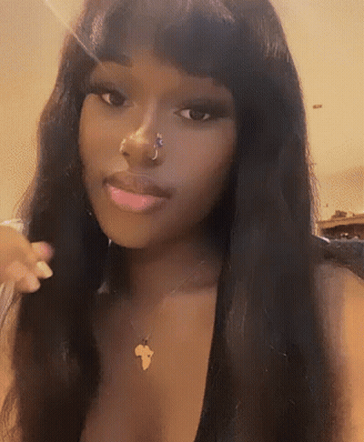 Woman With Nose Ring And Africa Map Necklace GIF