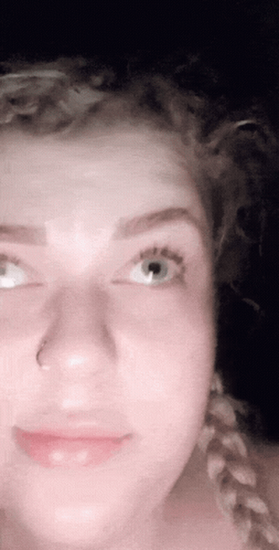 Woman With Nose Ring And Braids GIF