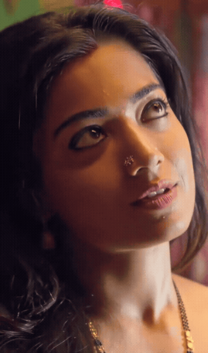Woman With Nose Ring Looking Up GIF