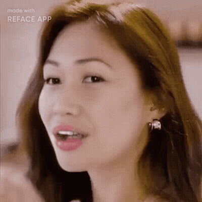Woman With Open Mouth And Earrings GIF