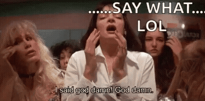 Woman With Open Mouth Sitting At Table With Group Of Women GIF