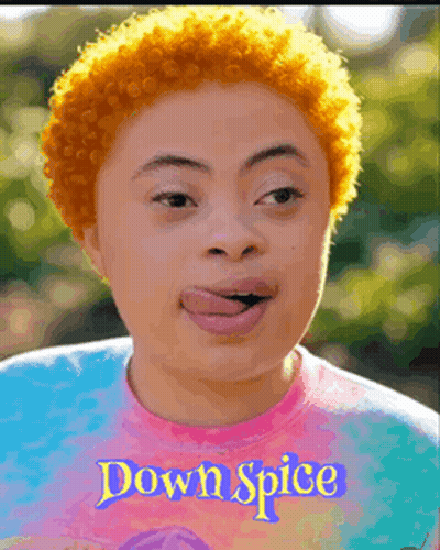 Woman With Orange Hair Wearing Tie Dye Shirt Saying Down Spice GIF