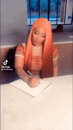 Woman With Orange Hair Writing GIF