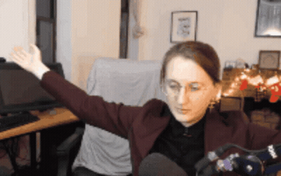 Woman With Outstretched Arms And Rode GIF