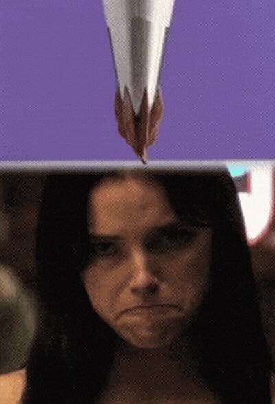 Woman With Paper Cone On Head GIF