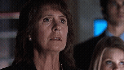 Woman With Pearl Earring Looking Up GIF