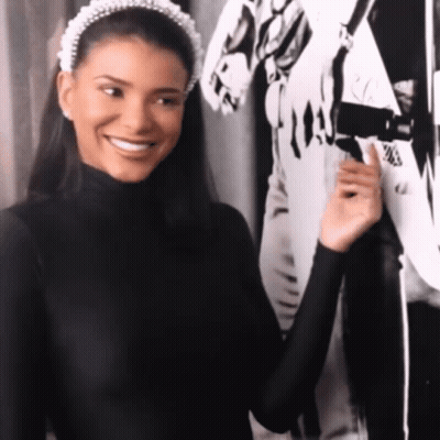 Woman With Pearl Headband Smiling GIF