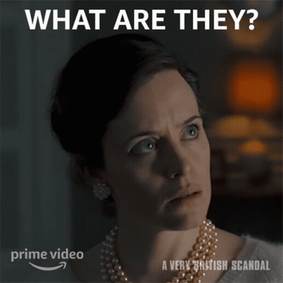 Woman With Pearl Necklace Saying What Are They GIF
