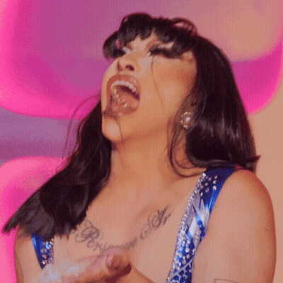 Woman With Perry Tattoo On Chest GIF