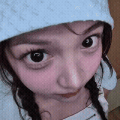 Woman With Pigtails And Hat GIF