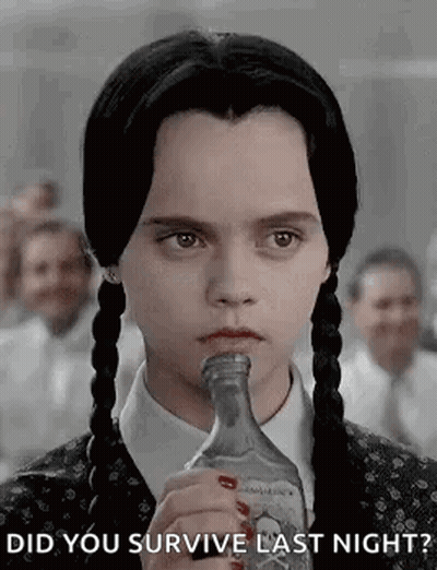 Woman With Pigtails Drinking Asking If She Survived Last Night GIF